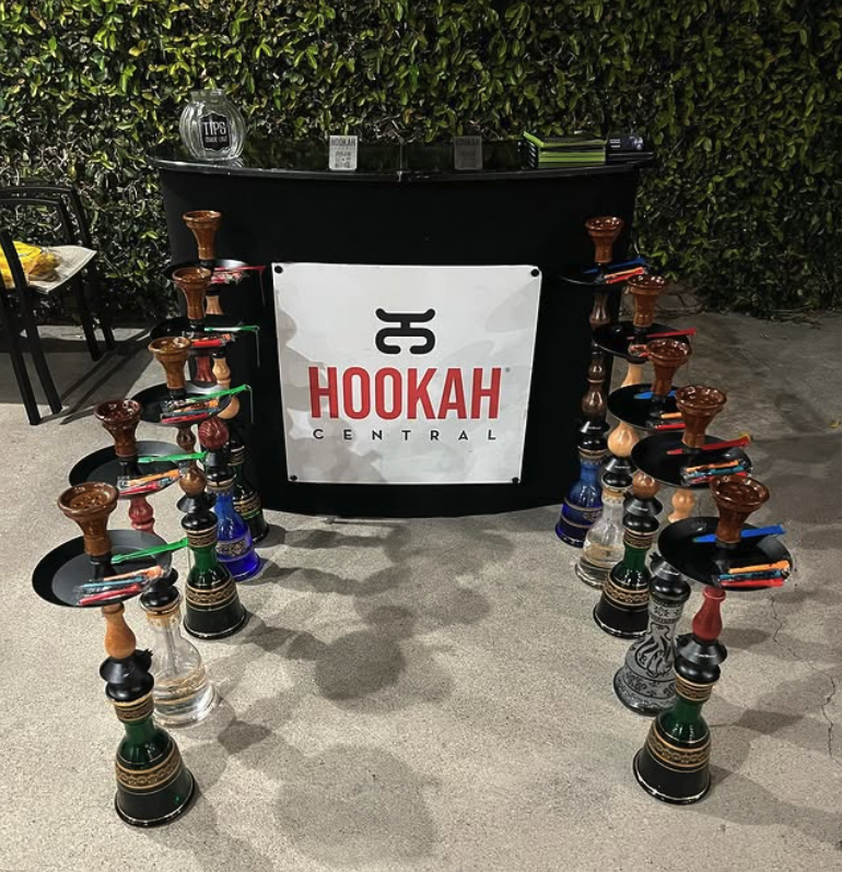 Crowd enjoying hookah setup